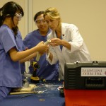 Dr. Amy Ladd assists participants of Stanford University 2012 Perry Outreach Program
